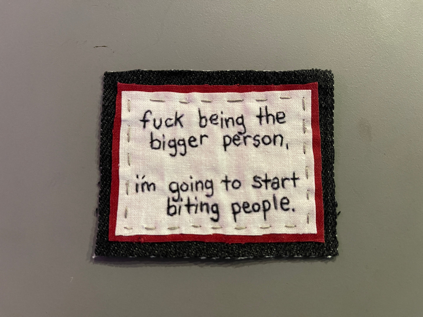 "biting people" patch