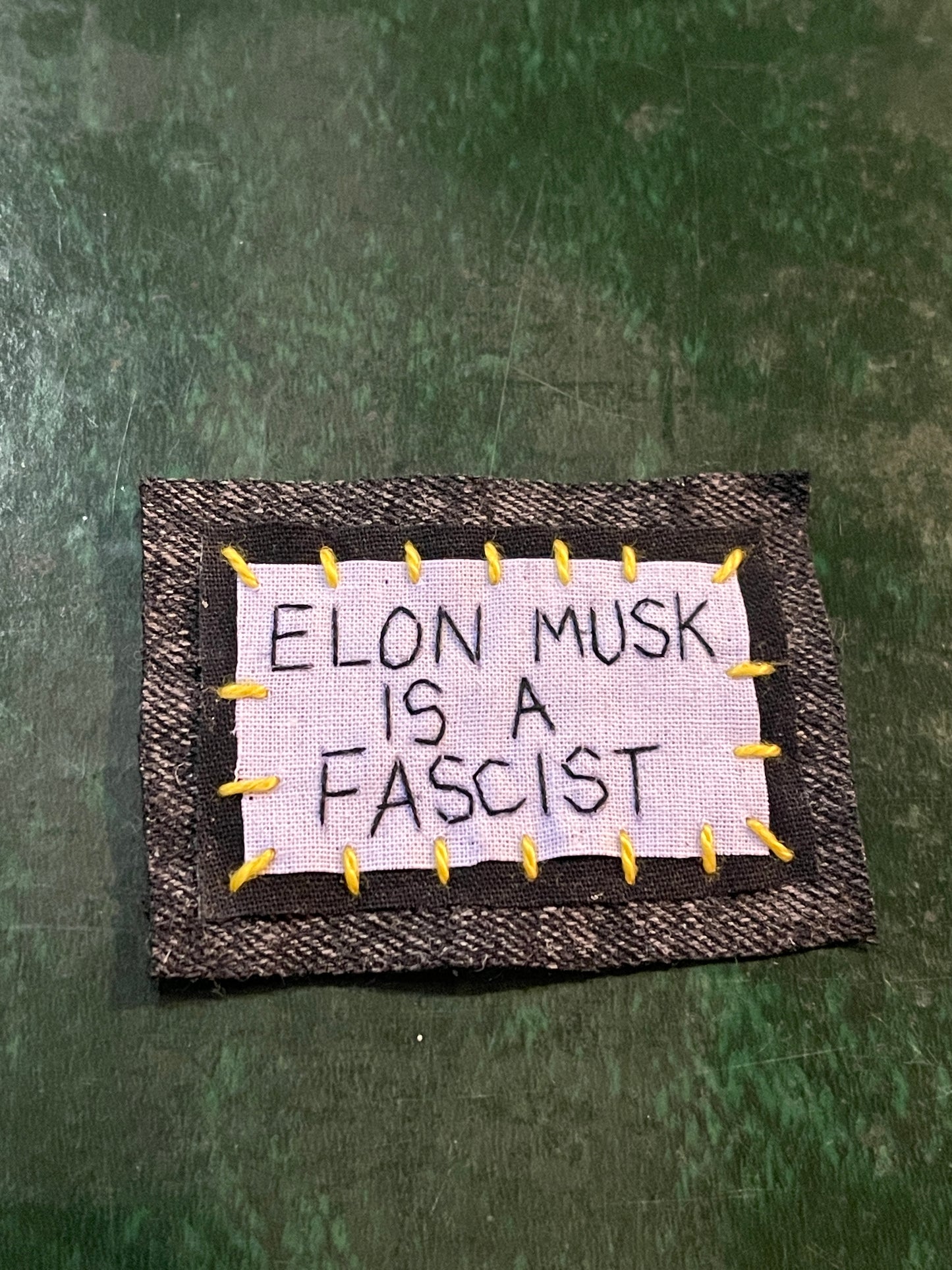 "elon musk is a fascist" patch