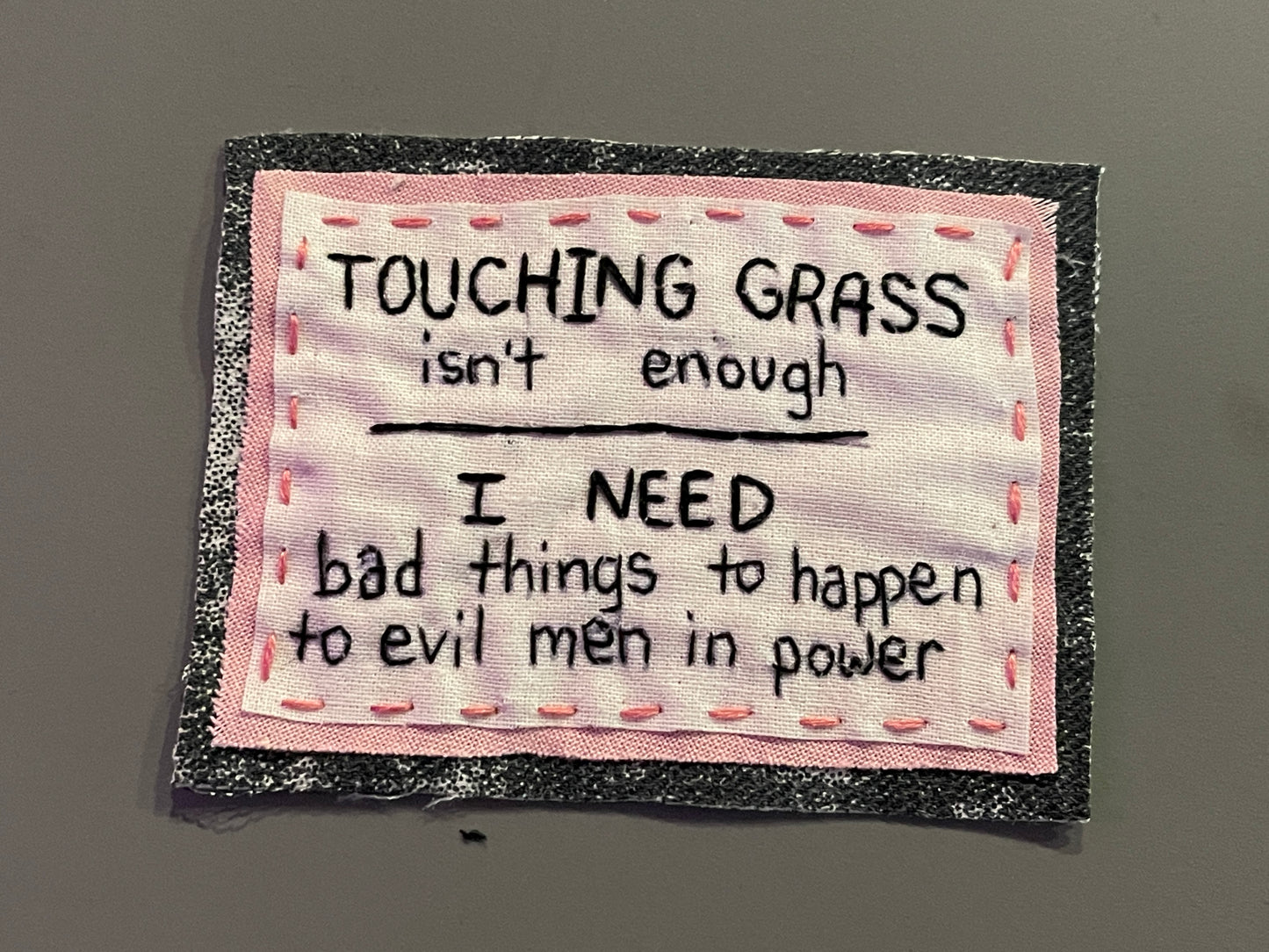 "touching grass" patch