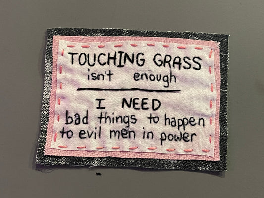 "touching grass" patch